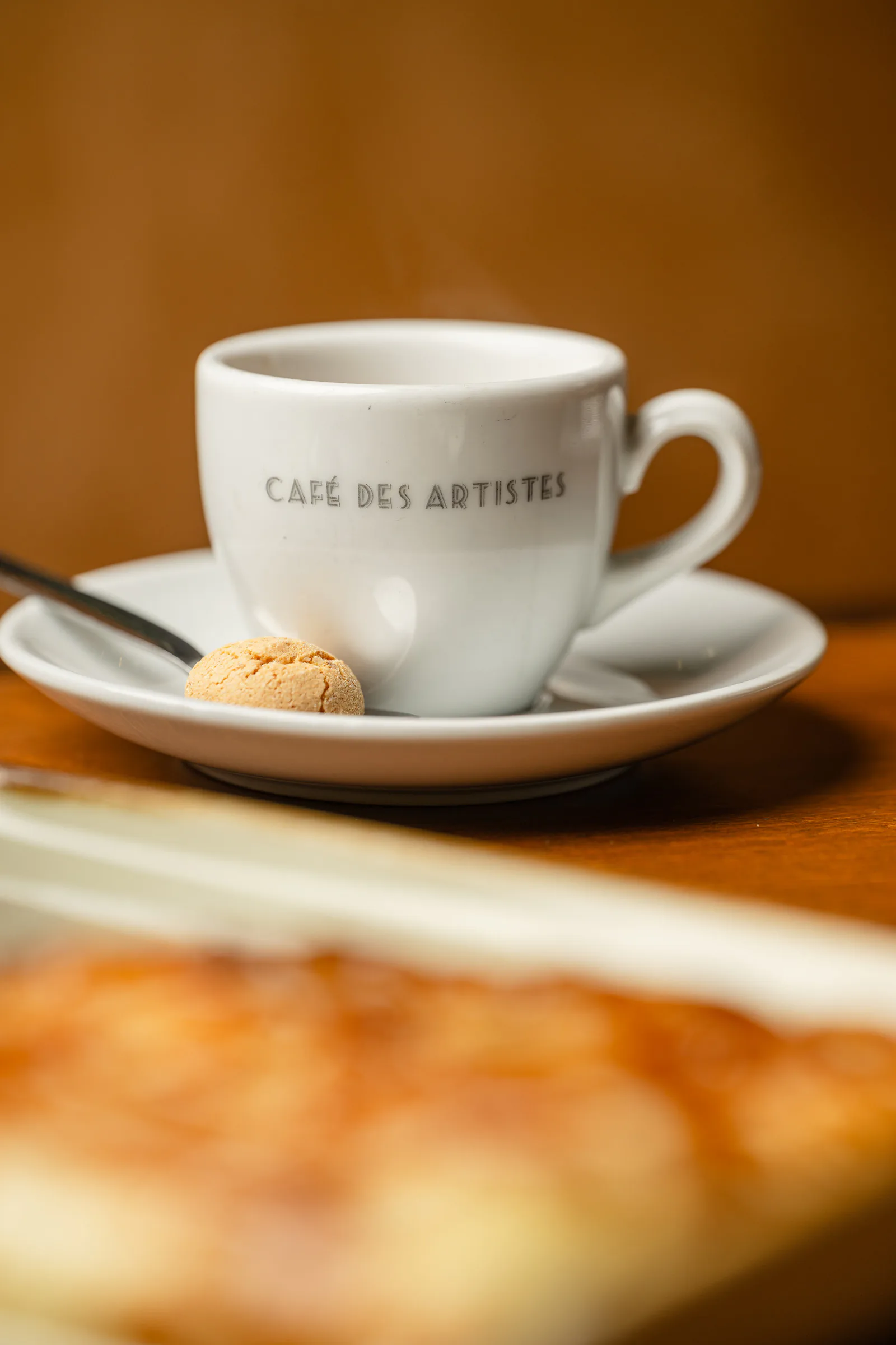 Espresso in der Tasse des Hauses